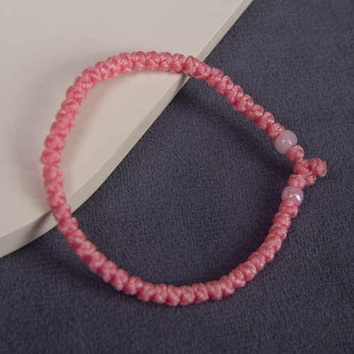 Браслет плетеный (комбоскини) с пластиковыми бусинами, розовый фото 3