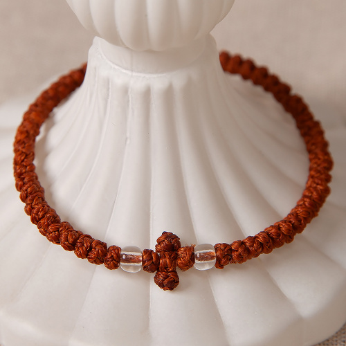 Браслет плетеный (четки-комбоскини) с пластиковыми бусинами, цвет коньячный