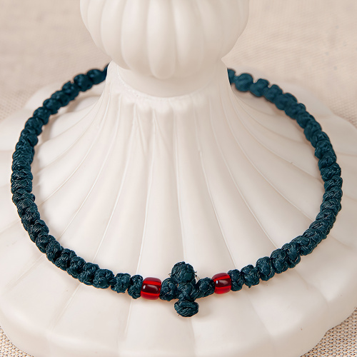 Браслет плетеный (четки-комбоскини) с пластиковыми бусинами, темно-зеленый Браслет плетеный (четки-комбоскини) с пластиковыми бусинами, темно-зеленый