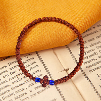 Браслет плетеный (четки-комбоскини) с пластиковыми бусинами, коричневый